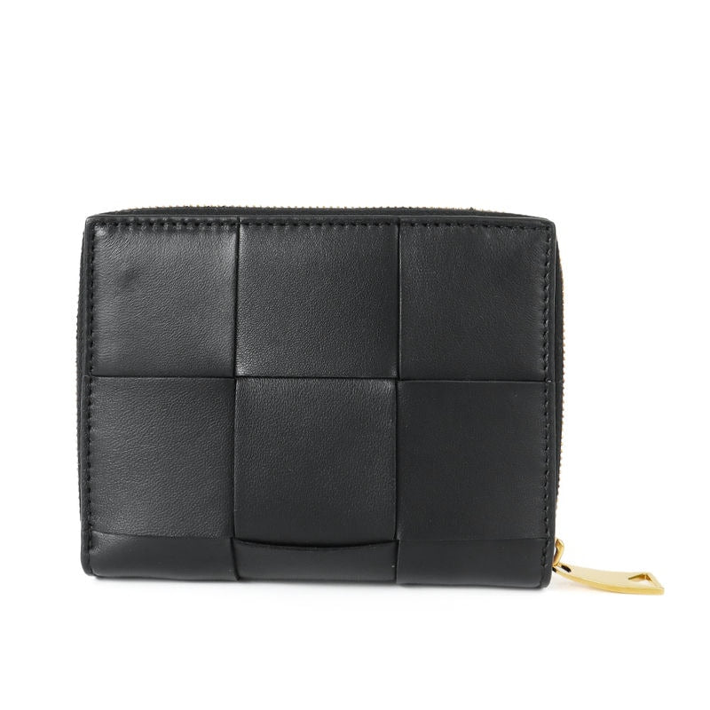 {Cupón de 8% de DESCUENTO} Cartera BOTTEGA VENETA Cartera plegable para hombre y mujer Cartera pequeña de piel Intrecciato negra 750252 VCQC1 8425 | Nueva marca Otoño/Invierno 2023AW