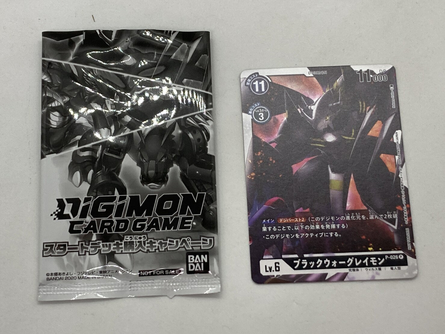 Paquete promocional P-026 Black War Greymon del juego de cartas Digimon