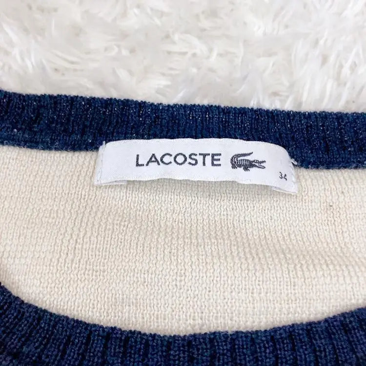 《LACOSTE》 Camiseta azul marino con borde beige talla 34