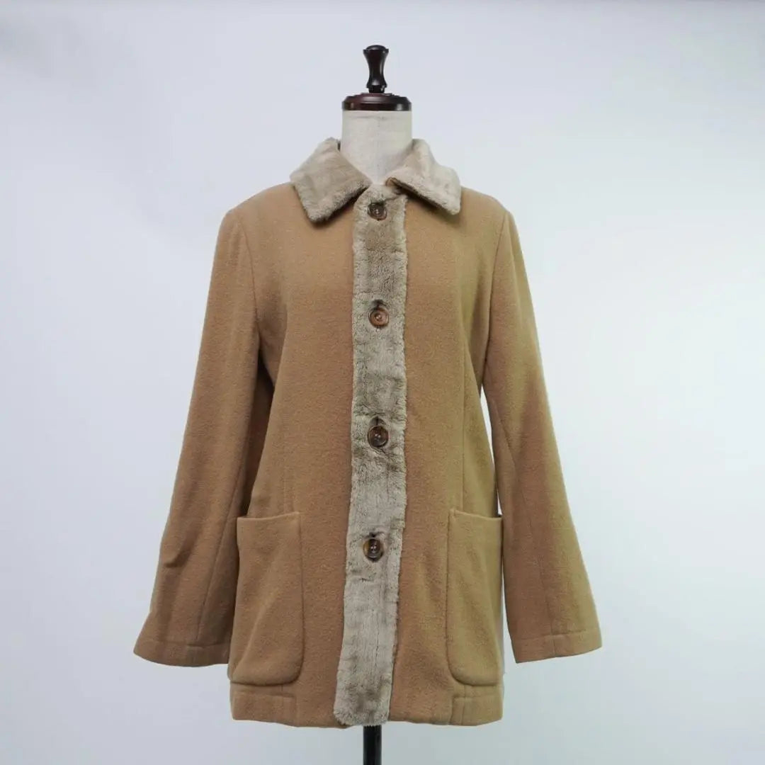 Chaqueta de pelo Trico Comme des Garcons beige en buen estado talla M