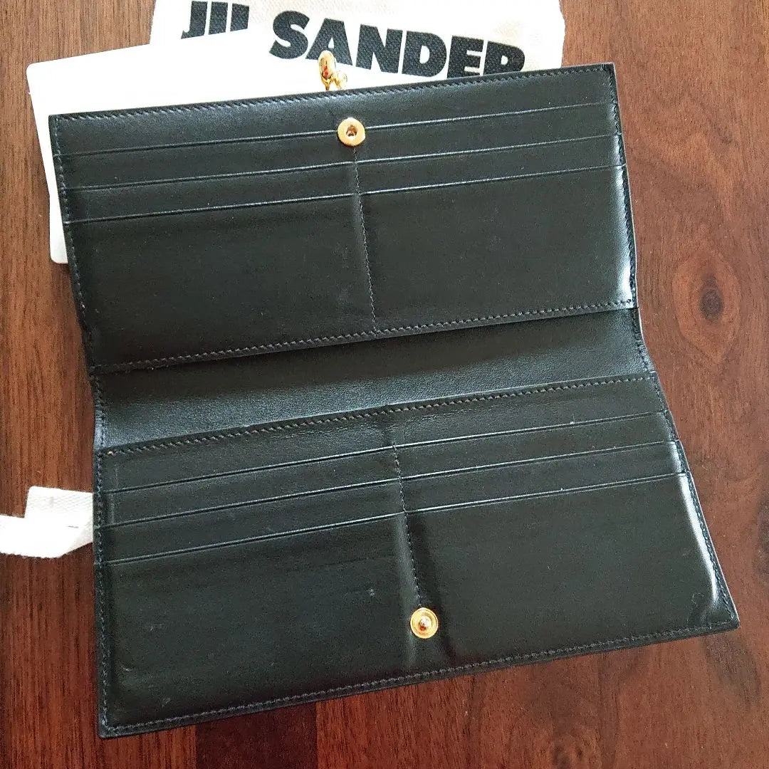 Cartera larga de JIL SANDER con error