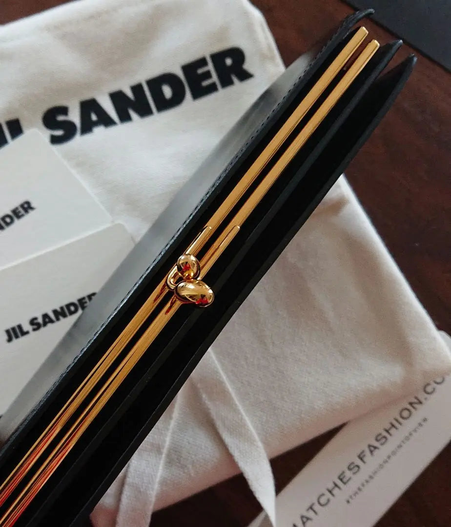 Cartera larga de JIL SANDER con error