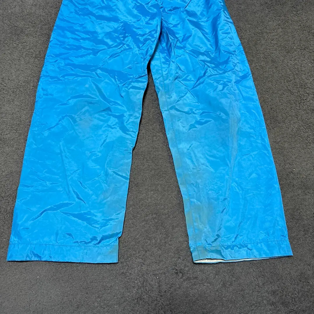 Conjunto impermeable y pantalón mont-bell 130