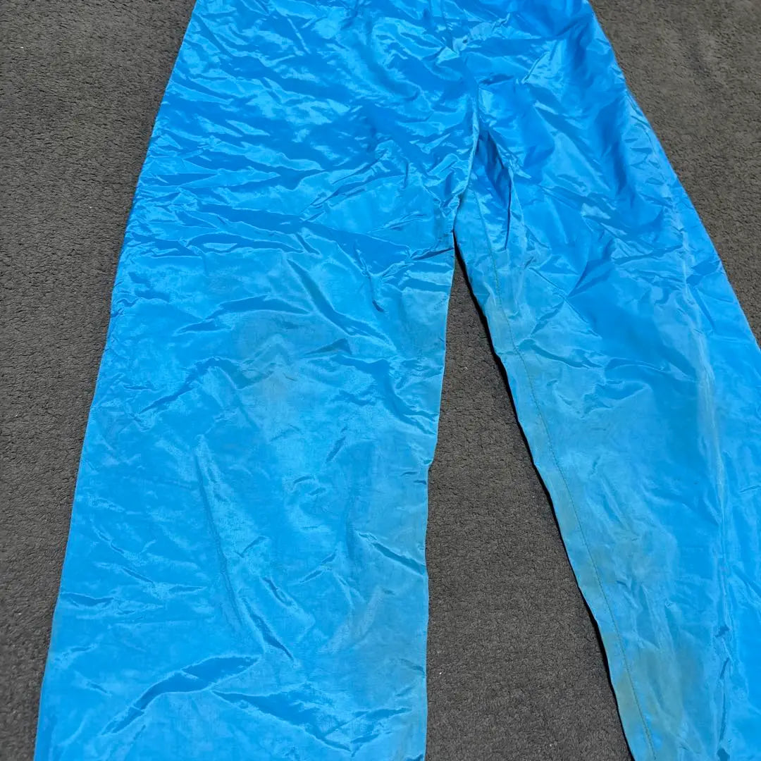 Conjunto impermeable y pantalón mont-bell 130