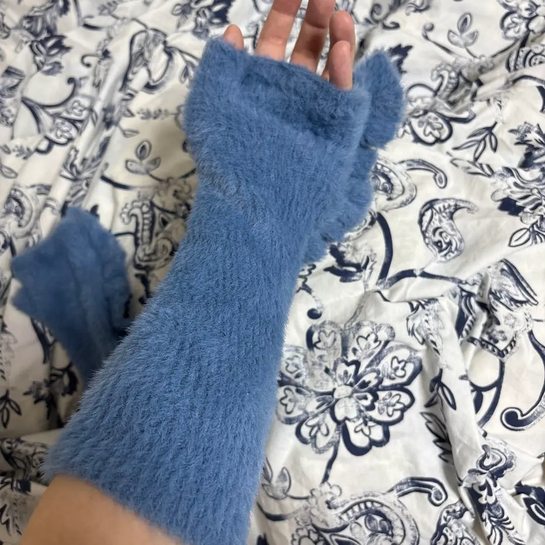 Guantes Casselini con mangas en color azul en buen estado