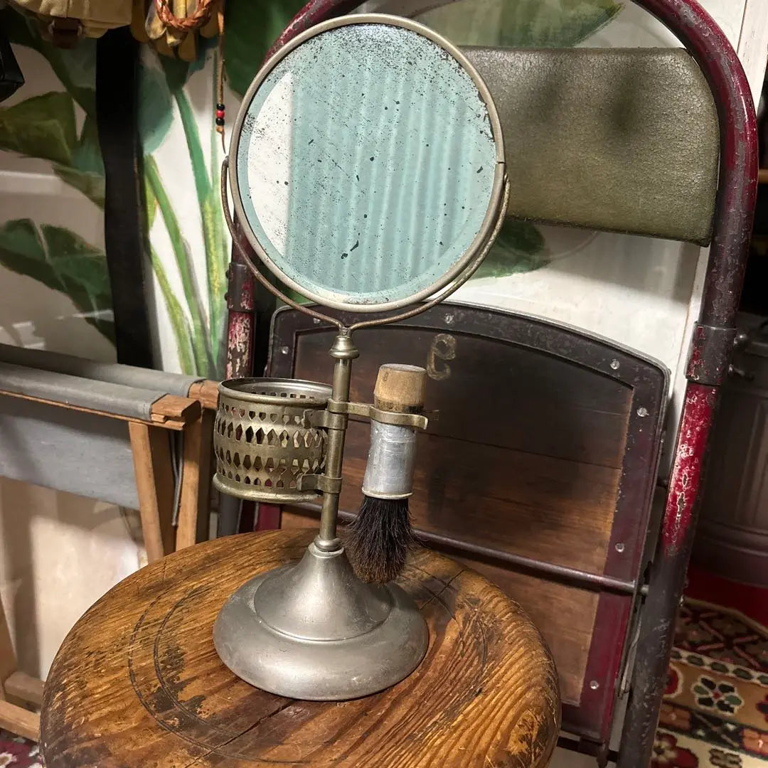 Vintage tabletop mirror with brush