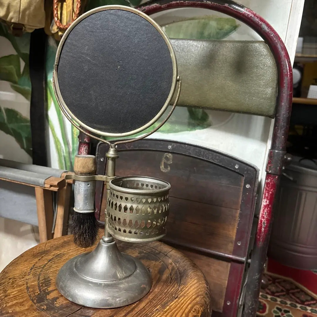 Vintage tabletop mirror with brush