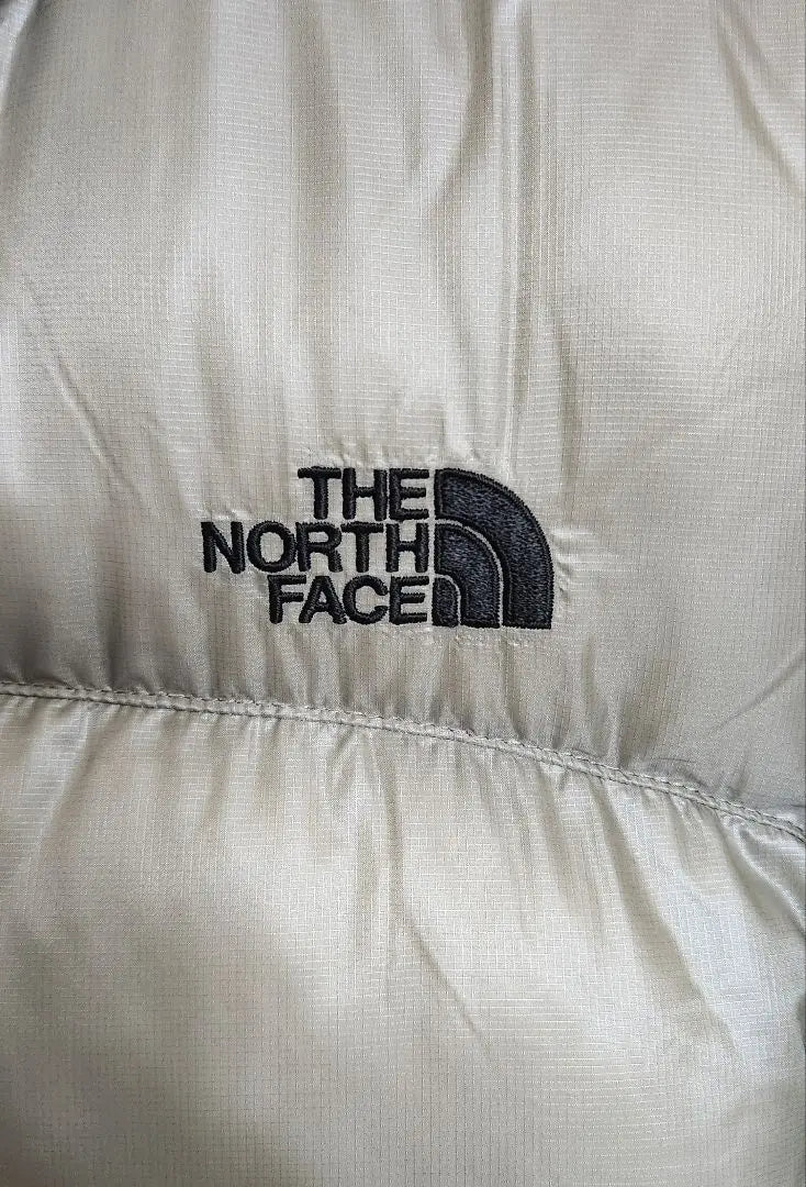 THE NORTH FACE Chaqueta de plumas beige | LA CARA NORTE