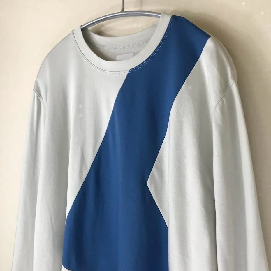 Asymmetric color scheme switching pullover