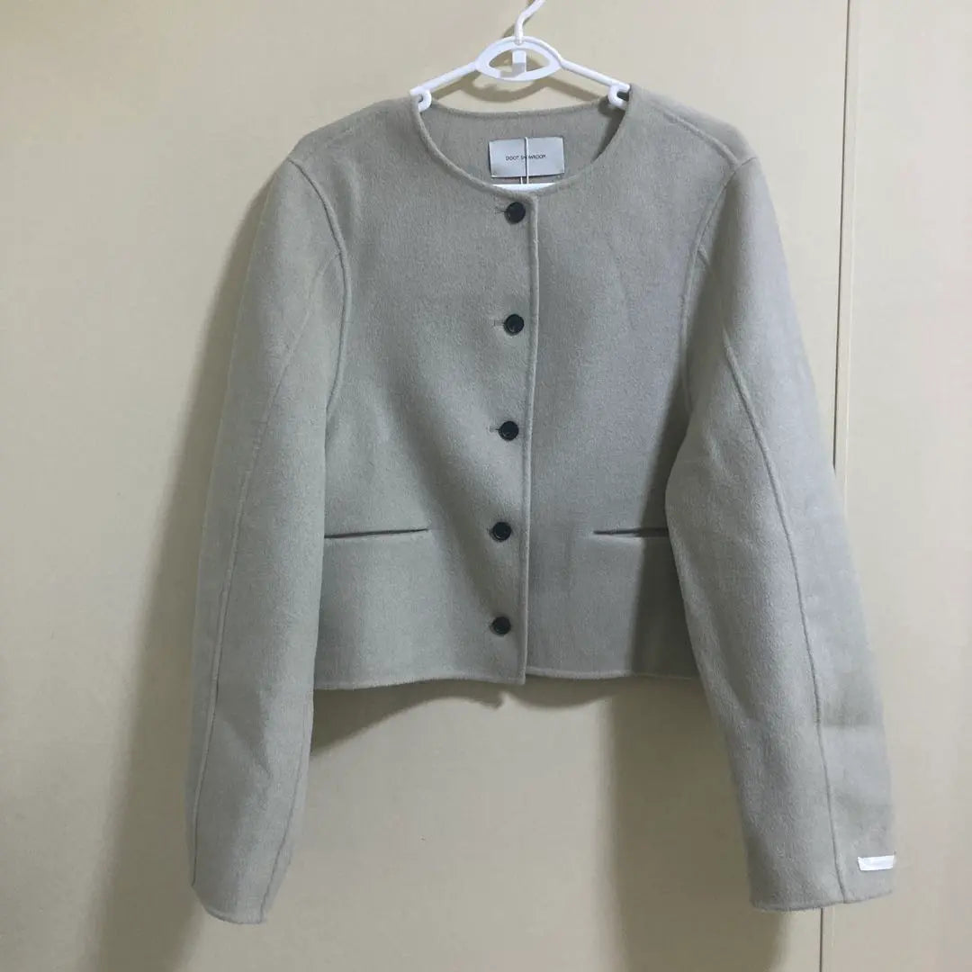 chaqueta de lana sin cuello didot showroom HECHA A MANO