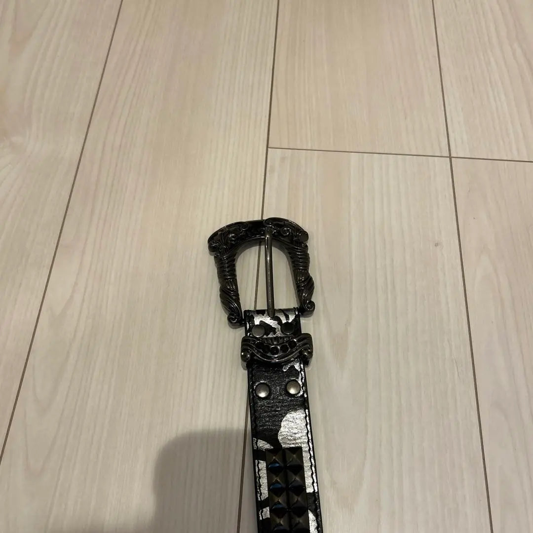 Black leather belt with studs