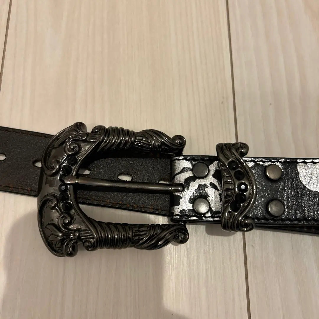 Black leather belt with studs