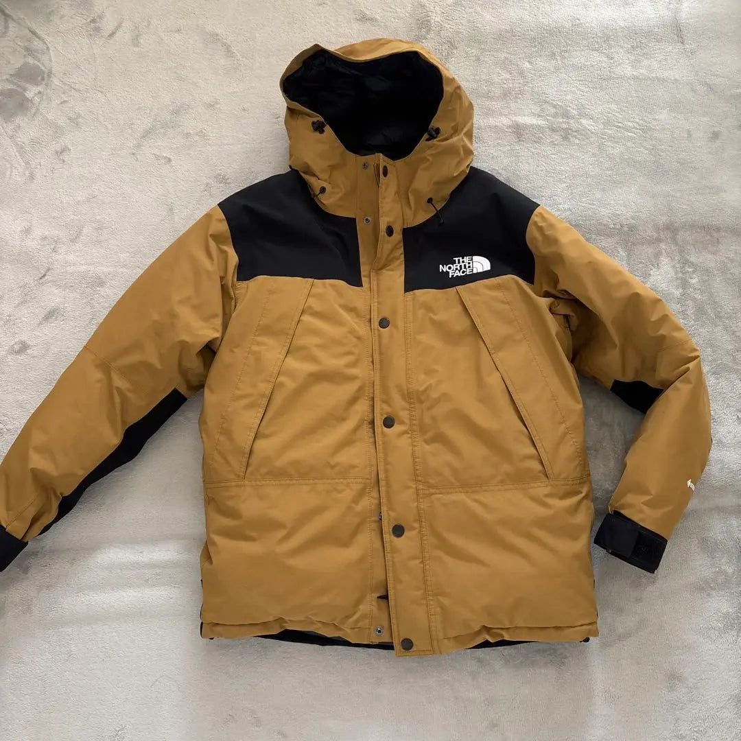 Chaqueta de plumas de montaña de North Face talla L