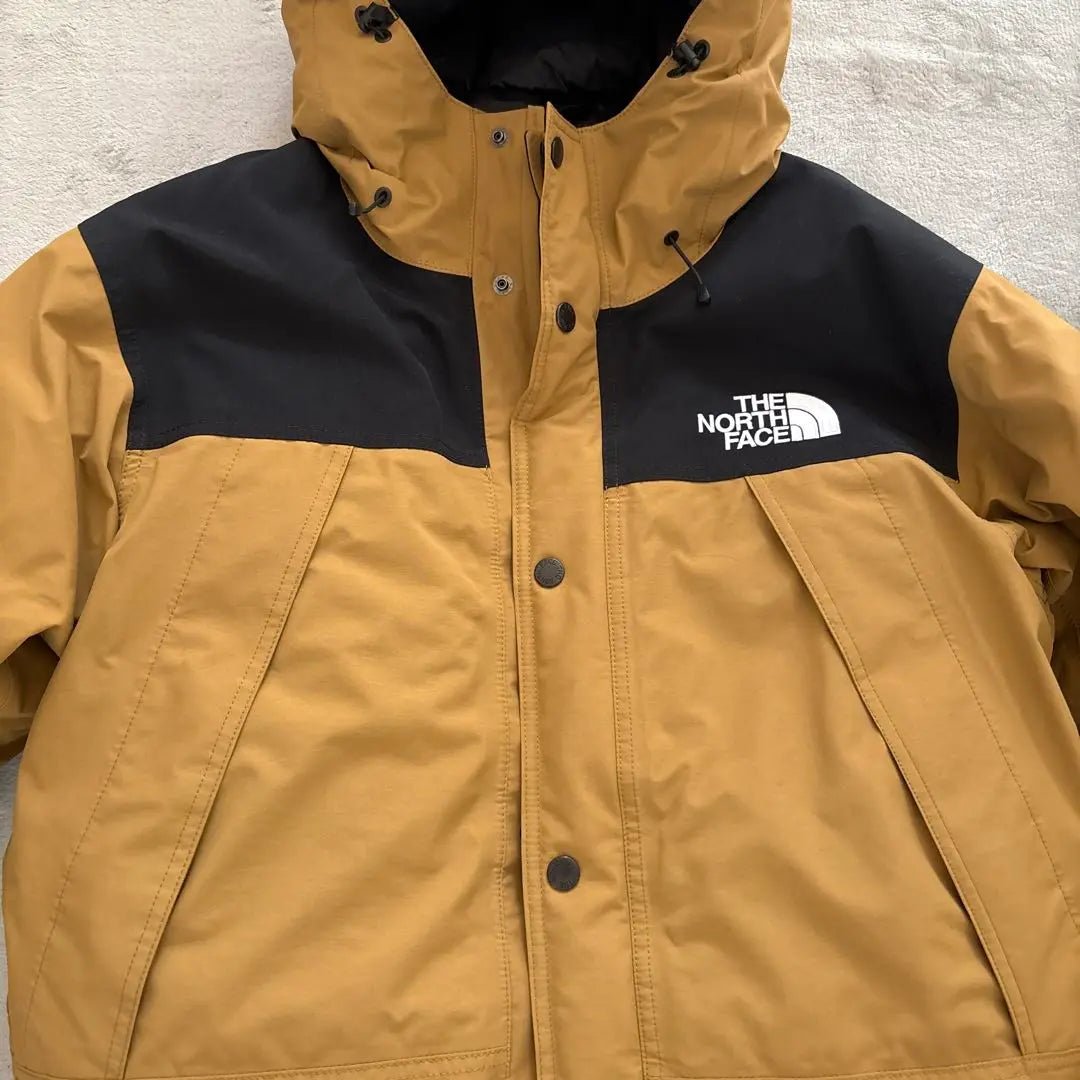 Chaqueta de plumas de montaña de North Face talla L