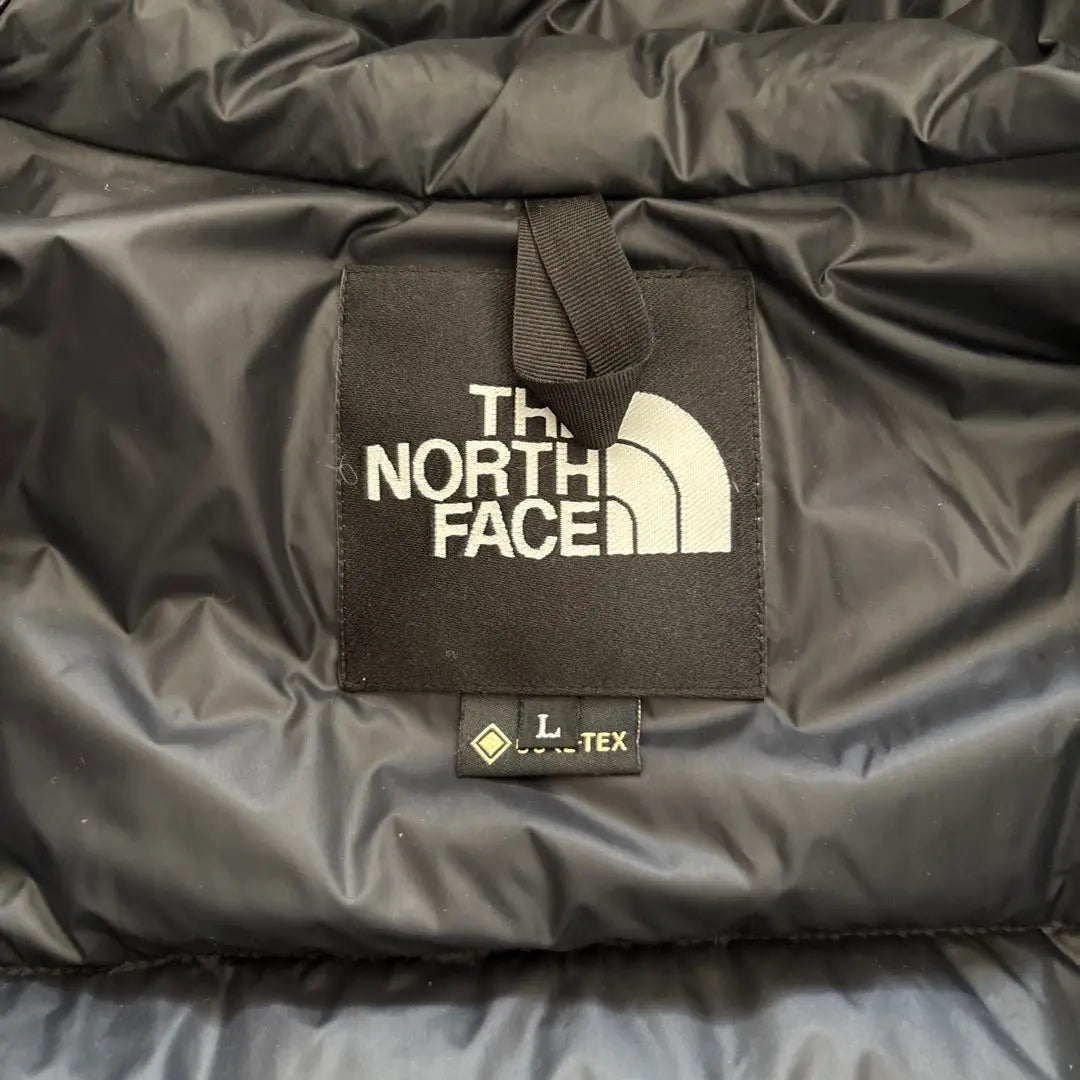 Chaqueta de plumas de montaña de North Face talla L