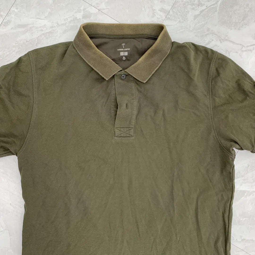 Polo Uniqlo Thomas Meyer liso verde oliva oscuro manga corta talla XL