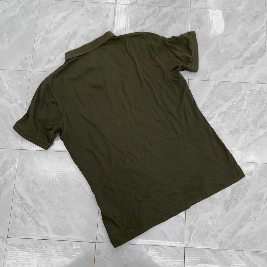 Polo Uniqlo Thomas Meyer liso verde oliva oscuro manga corta talla XL