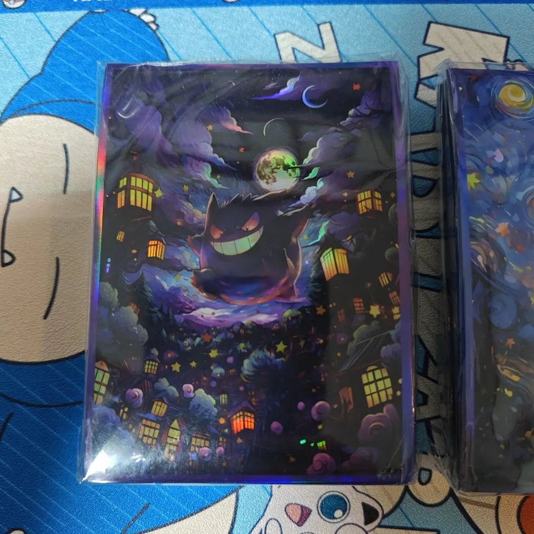 Funda protectora para el mazo de cartas del juego Pokémon con diseño de Gengar y Pikachu