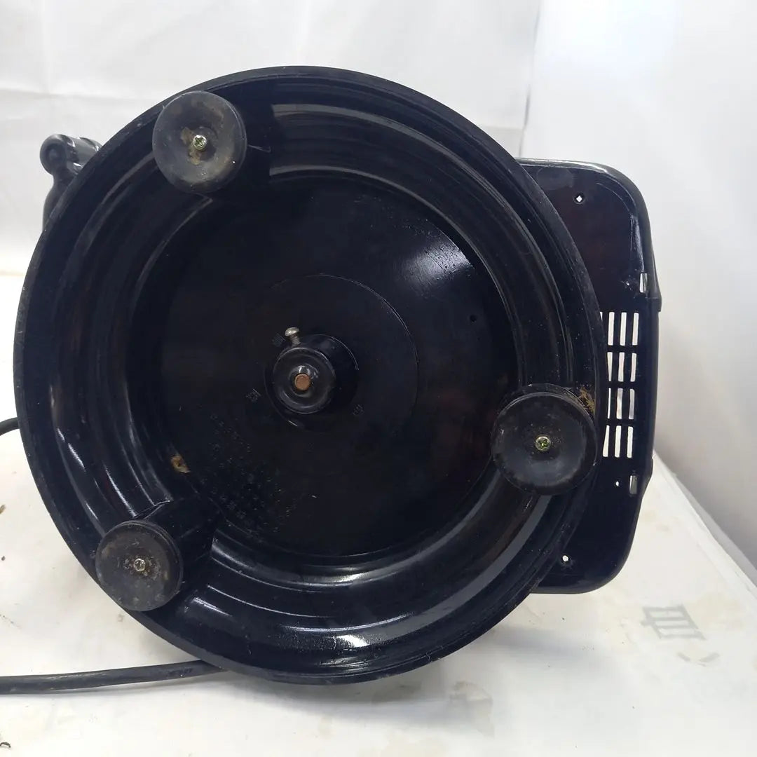 Dial type black telephone with rotating stand