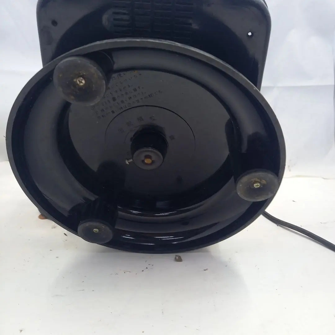 Dial type black telephone with rotating stand