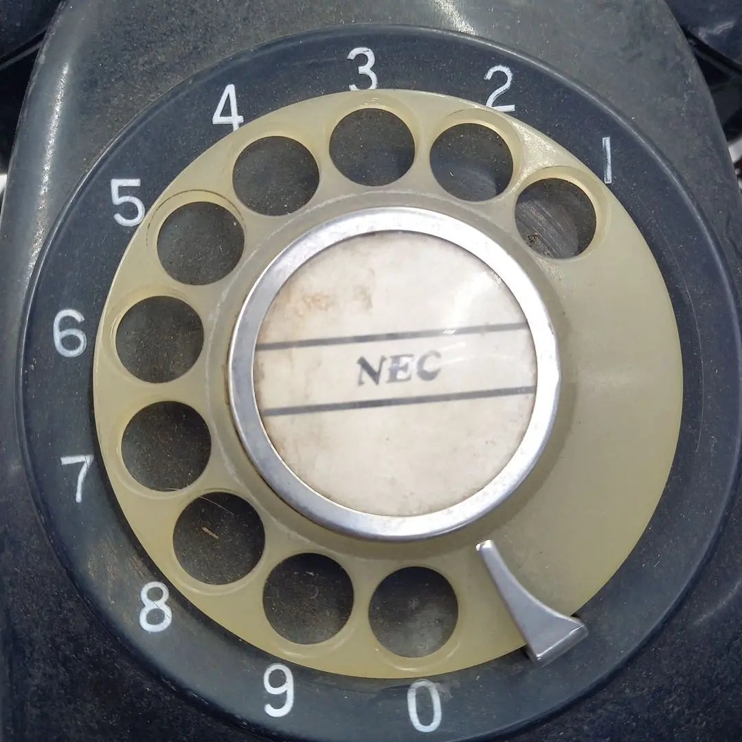 Dial type black telephone with rotating stand