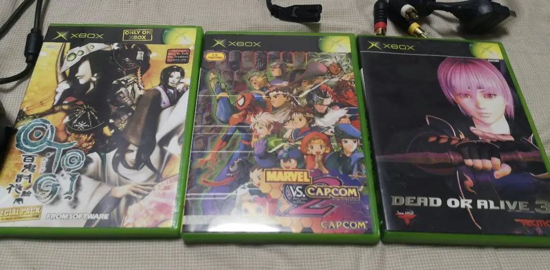 Mando de consola Xbox basura con 3 juegos