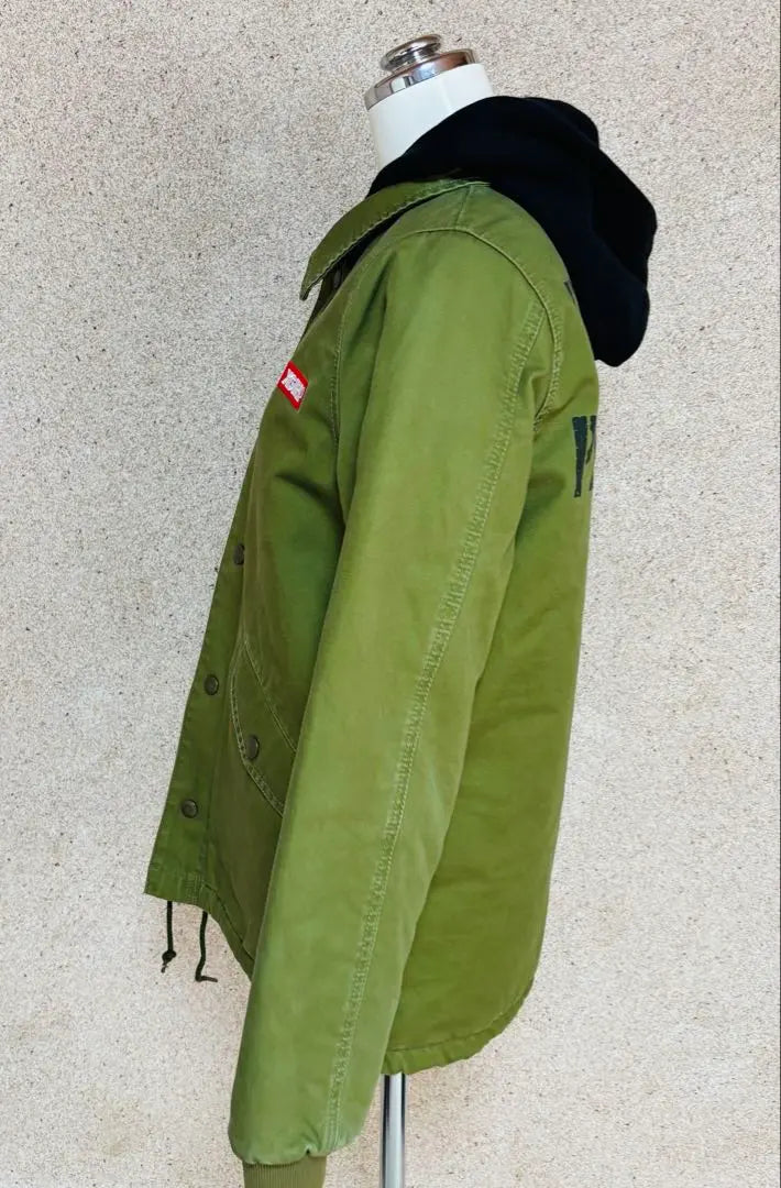 In good condition! X-Girl military style coach jacket khaki back print