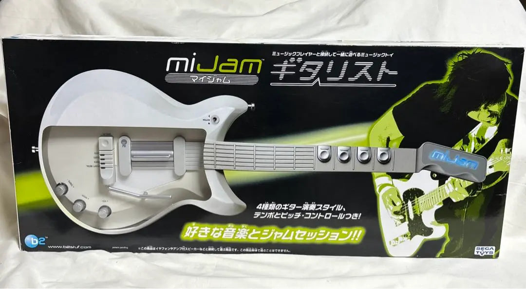 Brand new, unopened, miJam guitarist Sega Toys