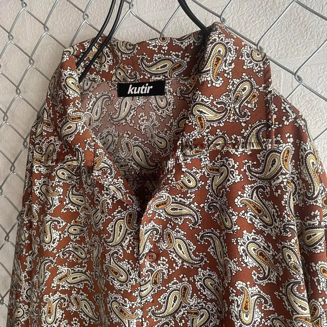 Paisley, multi-colored, loose dowel, thick arm, poly shirt, open collar