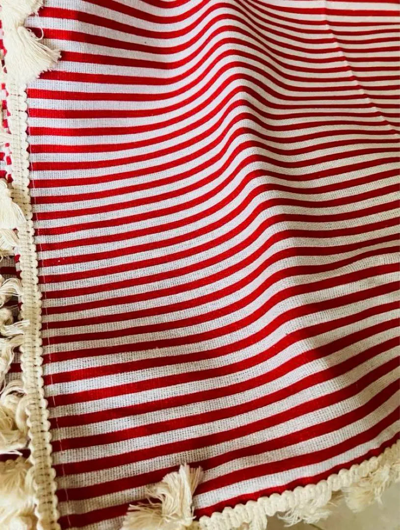 New red and white striped tablecloth with fringe