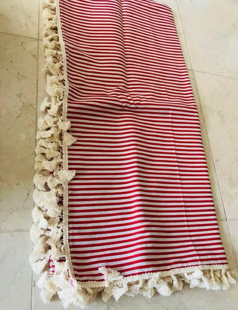 New red and white striped tablecloth with fringe