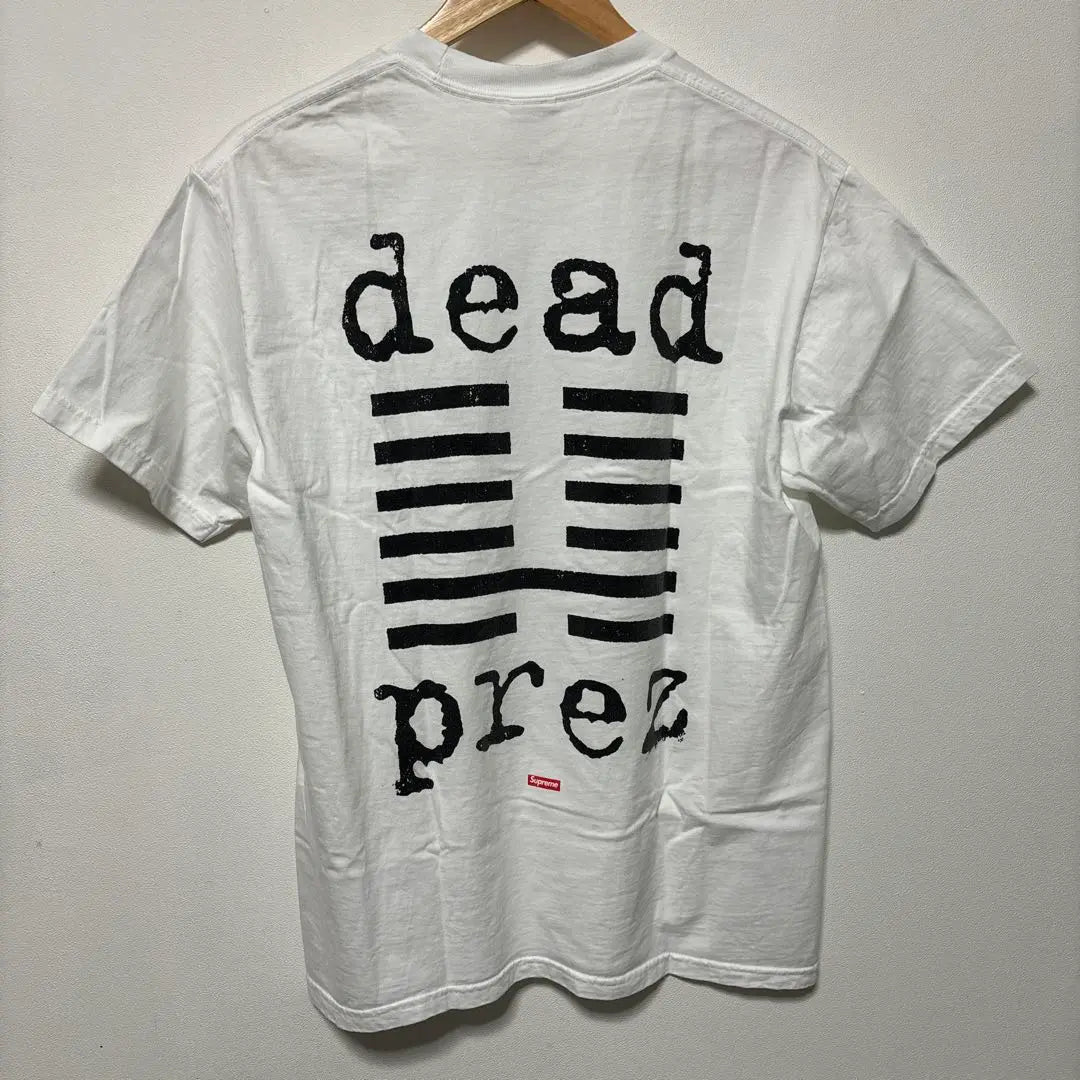 Camiseta Suprema Suprema 19aw Dead Prez Dead Su | SUPREMO シュプリーム 19AW dead prez Tee デッドプレズ