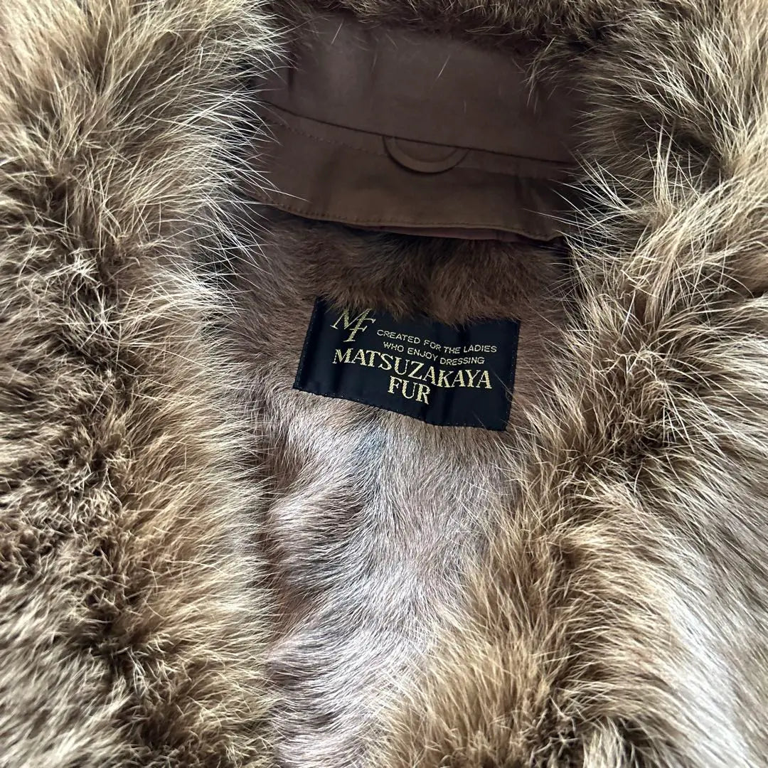 Erba travel Diolen long coat with fur