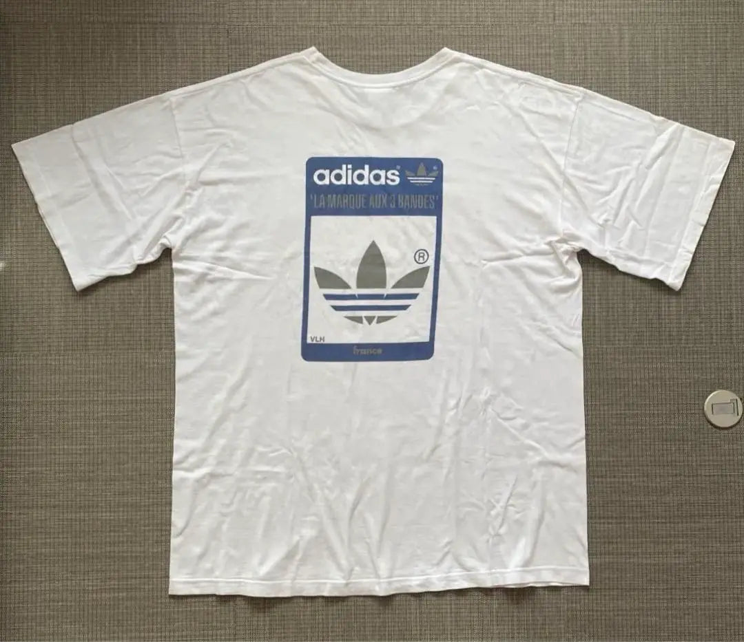 ★[Raro] Camiseta adidas con etiqueta de trébol y bandera universal de los años 80, fabricada en EE. UU., XL