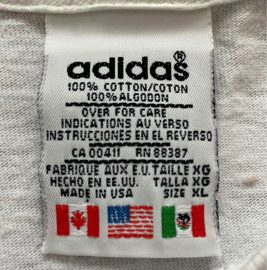 ★[Raro] Camiseta adidas con etiqueta de trébol y bandera universal de los años 80, fabricada en EE. UU., XL