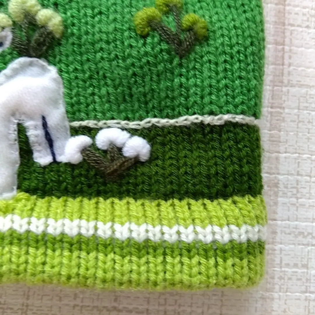 One-of-a-kind baby clothes, hand-knitted hoodies, alpaca, llama