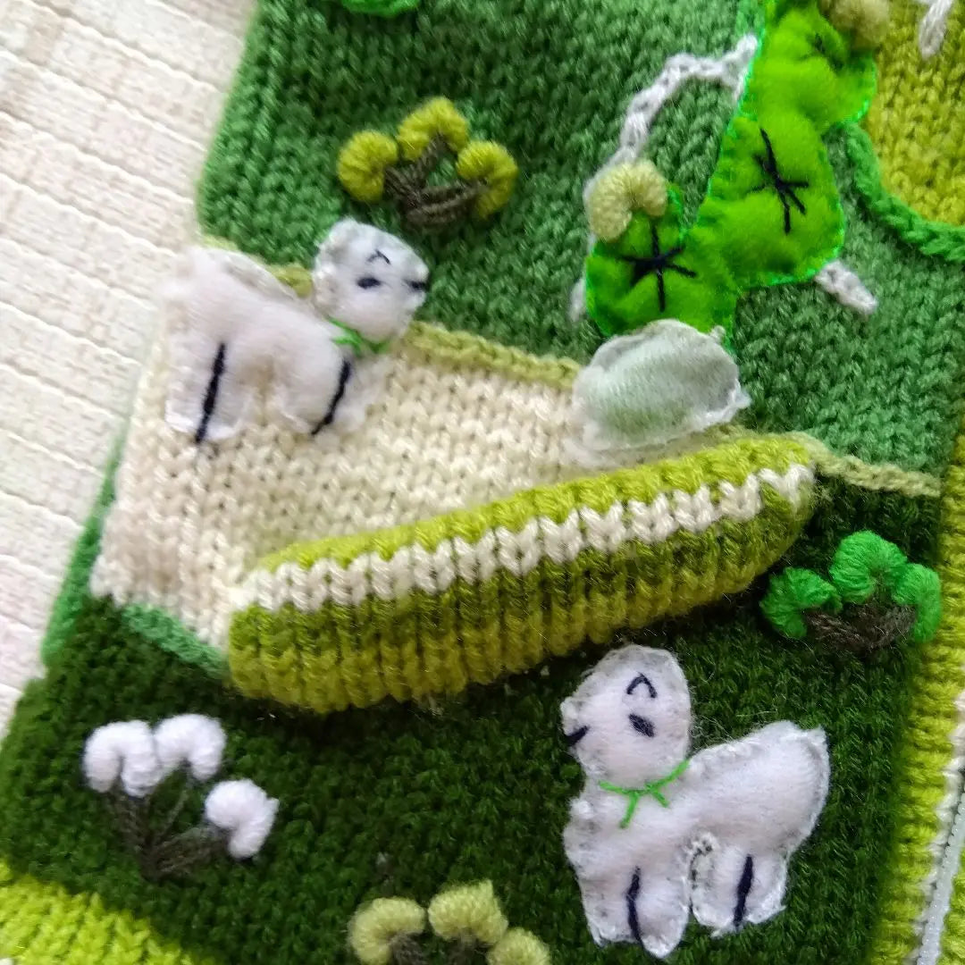 One-of-a-kind baby clothes, hand-knitted hoodies, alpaca, llama