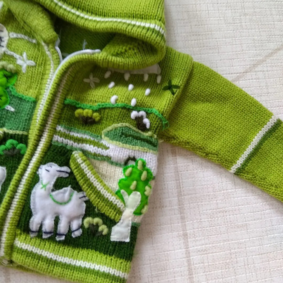 One-of-a-kind baby clothes, hand-knitted hoodies, alpaca, llama