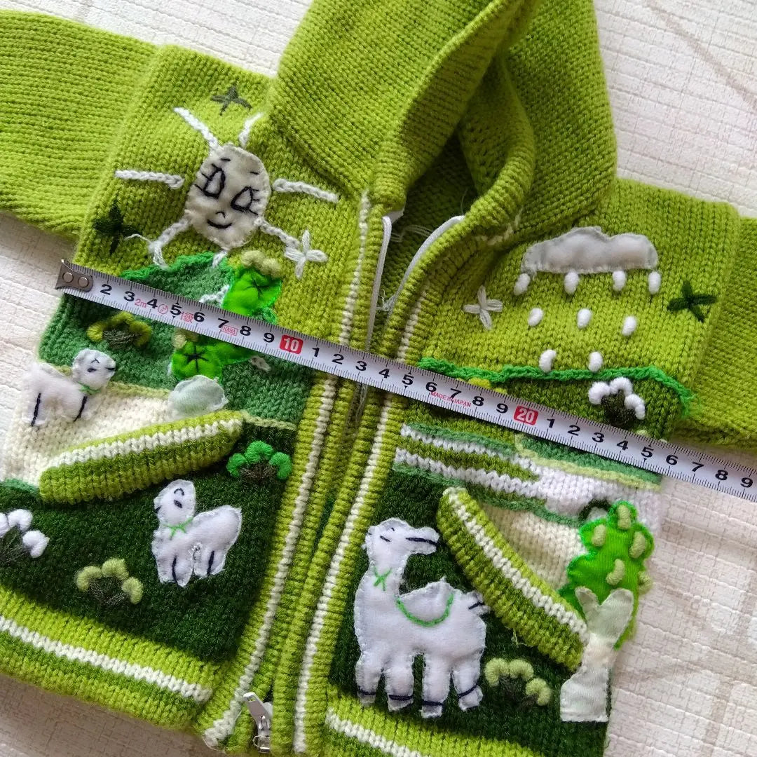 One-of-a-kind baby clothes, hand-knitted hoodies, alpaca, llama