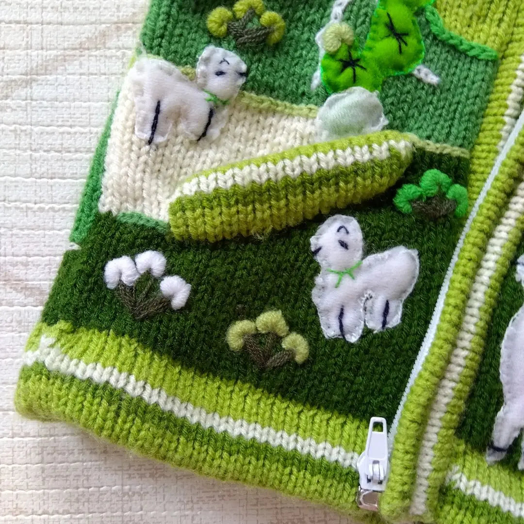 One-of-a-kind baby clothes, hand-knitted hoodies, alpaca, llama