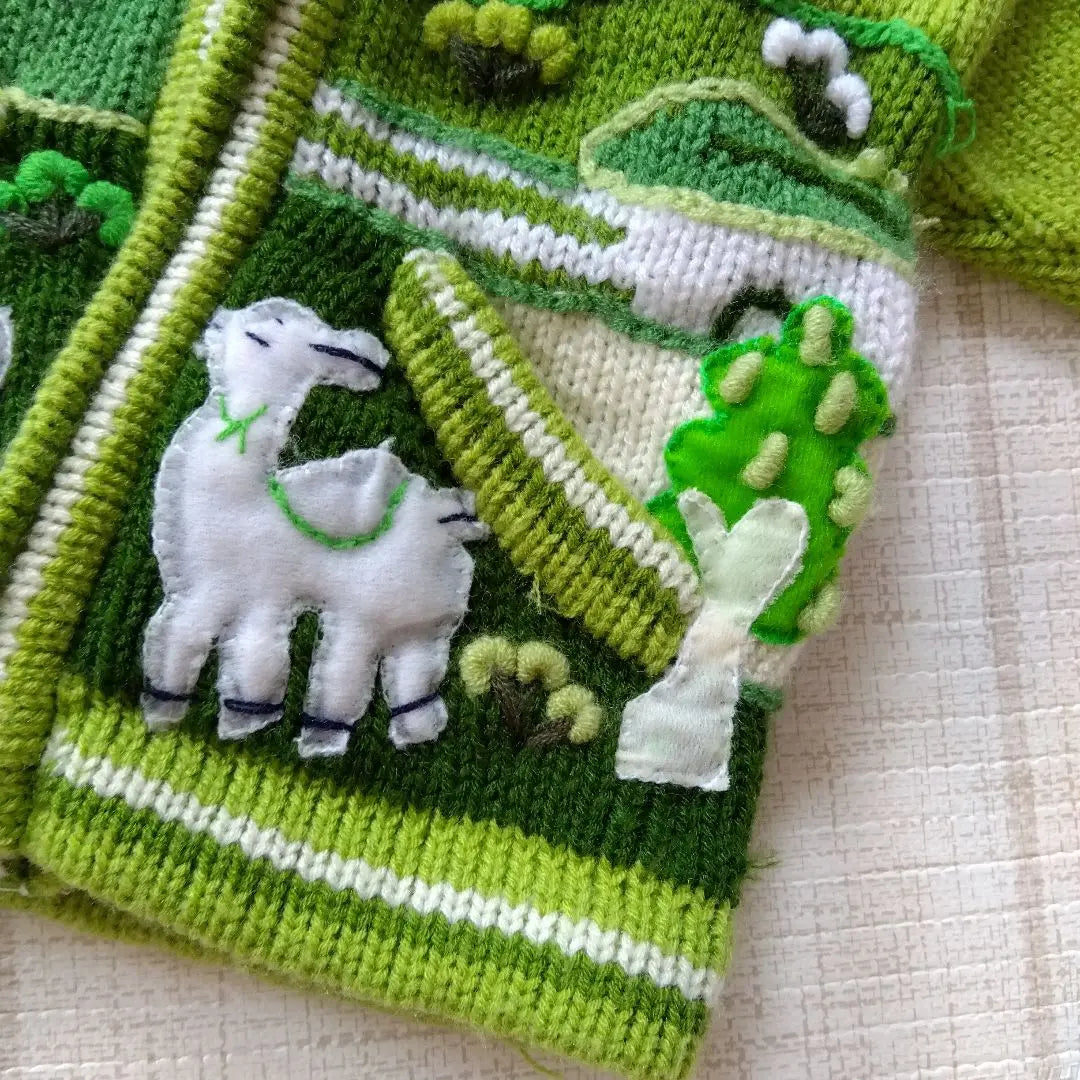 One-of-a-kind baby clothes, hand-knitted hoodies, alpaca, llama