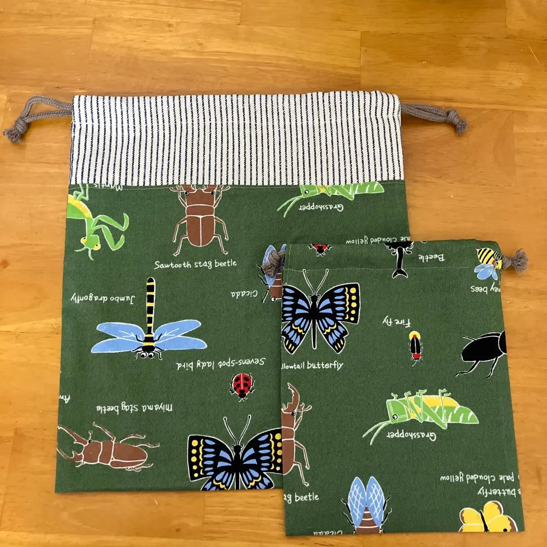 Handmade 4-piece set of kindergarten and school entrance, moss green ground, insects, natural blue stripes