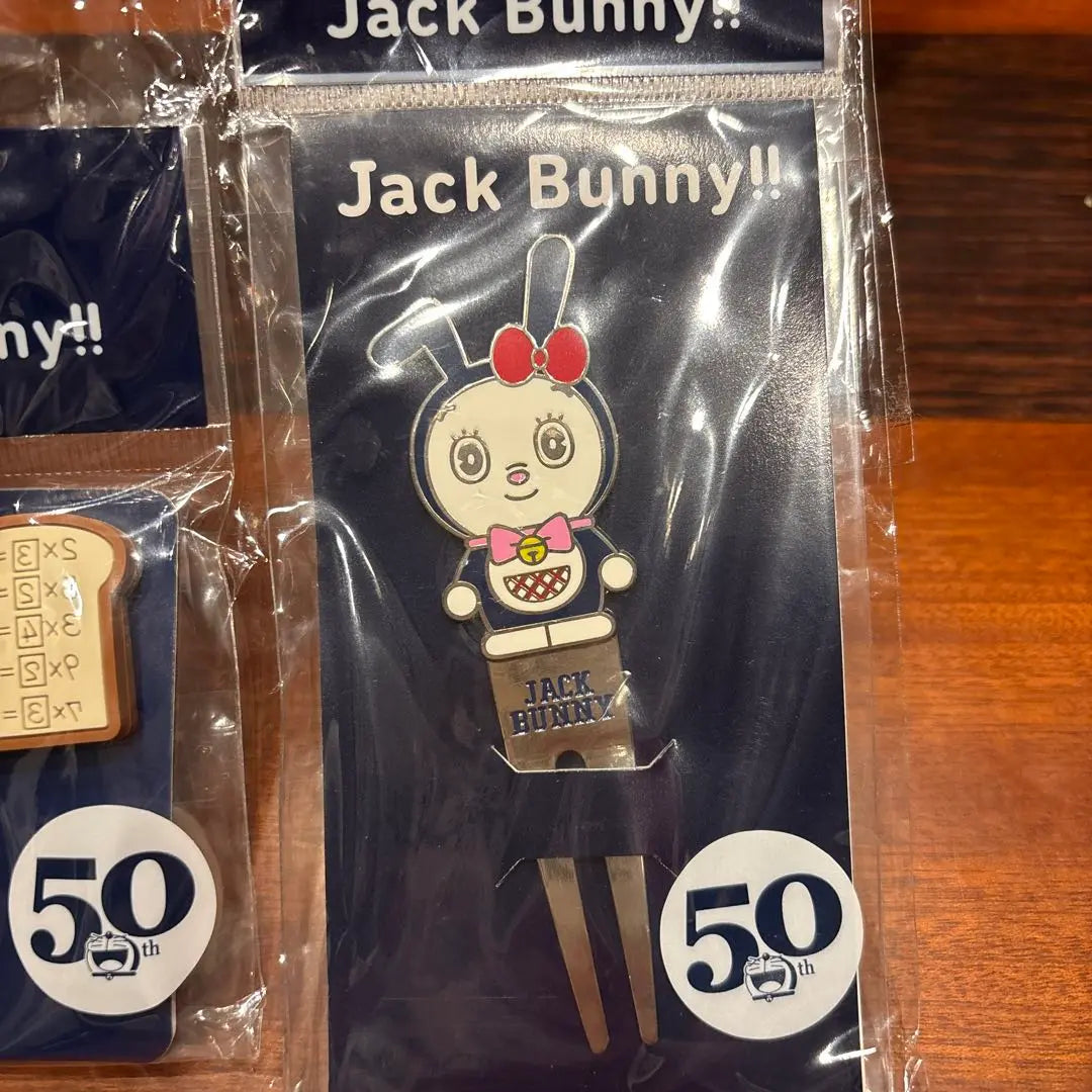 Juego de marcadores de golf del 50.° aniversario de Jack Bunny