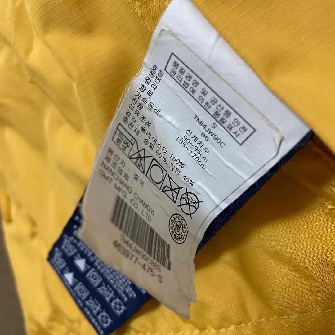 Chaqueta de plumas Tommy Hilfiger para hombre reversible azul marino amarillo