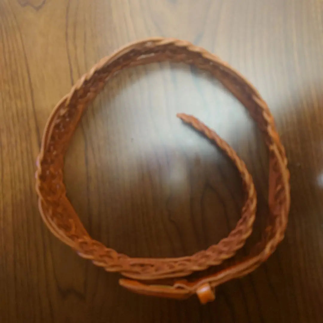 Brown leather braided belt