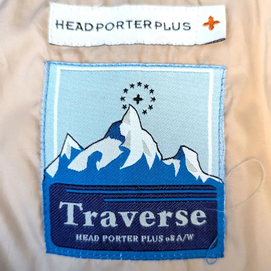 Chaqueta de plumas HEADPORTER PLUS Colaboración Traverse | HEADPORTER PLUS ダウンジャケット Traverse コラボ