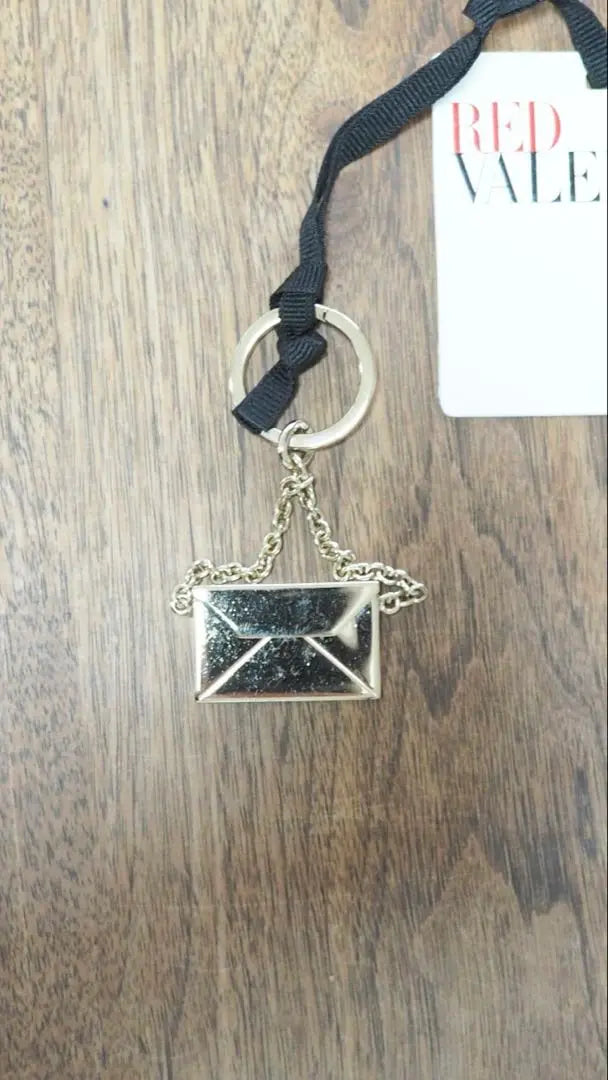 Clutch bag type keychain made in Italy This is a sample product.