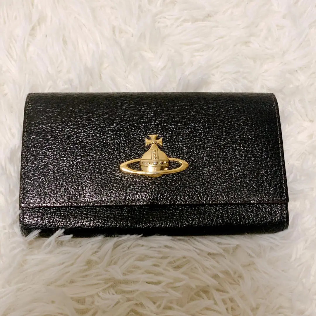 Cartera larga Vivienne Westwood en color orbe negro en perfecto estado