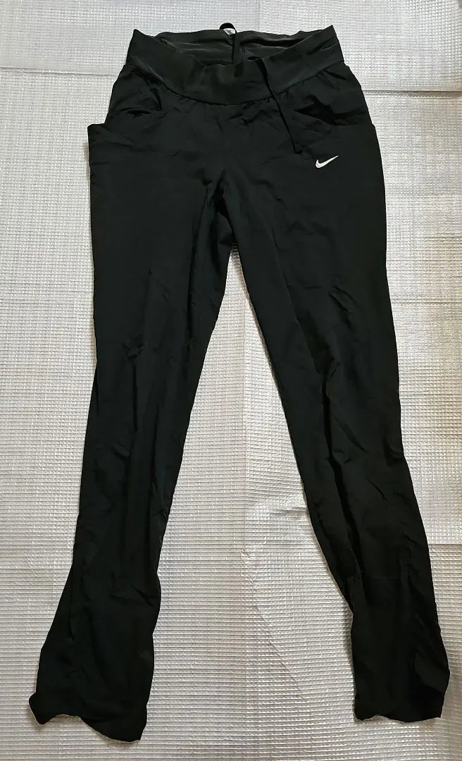 Pantalones de entrenamiento negros Nike Dry Fit Pantalones largos para mujer