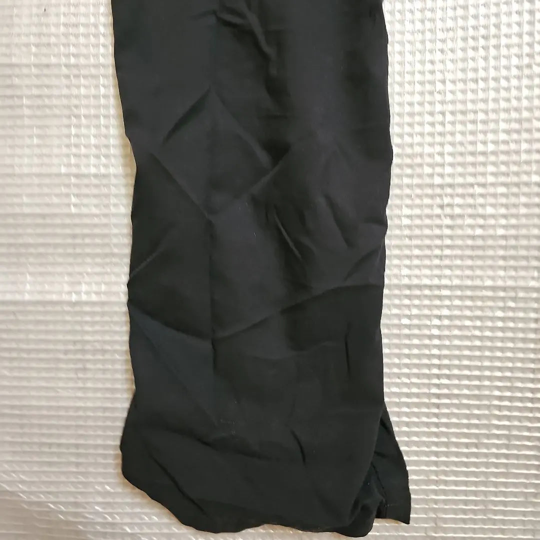 Pantalones de entrenamiento negros Nike Dry Fit Pantalones largos para mujer